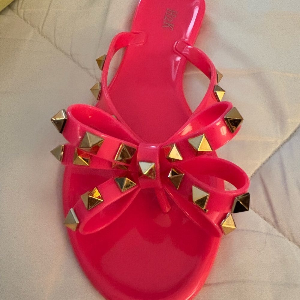 Stylish Pink Sandals with Gold Accents